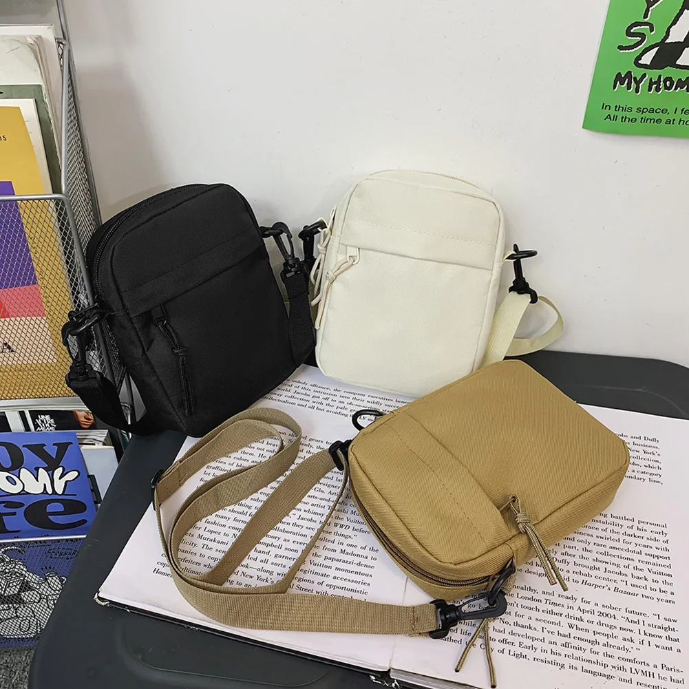 2023 Оксфорд Дамски чанти Crossbody Малки чанти за рамо за мъже Корейски плътен цвят студенти телефонни чанти Мини куриер чанти